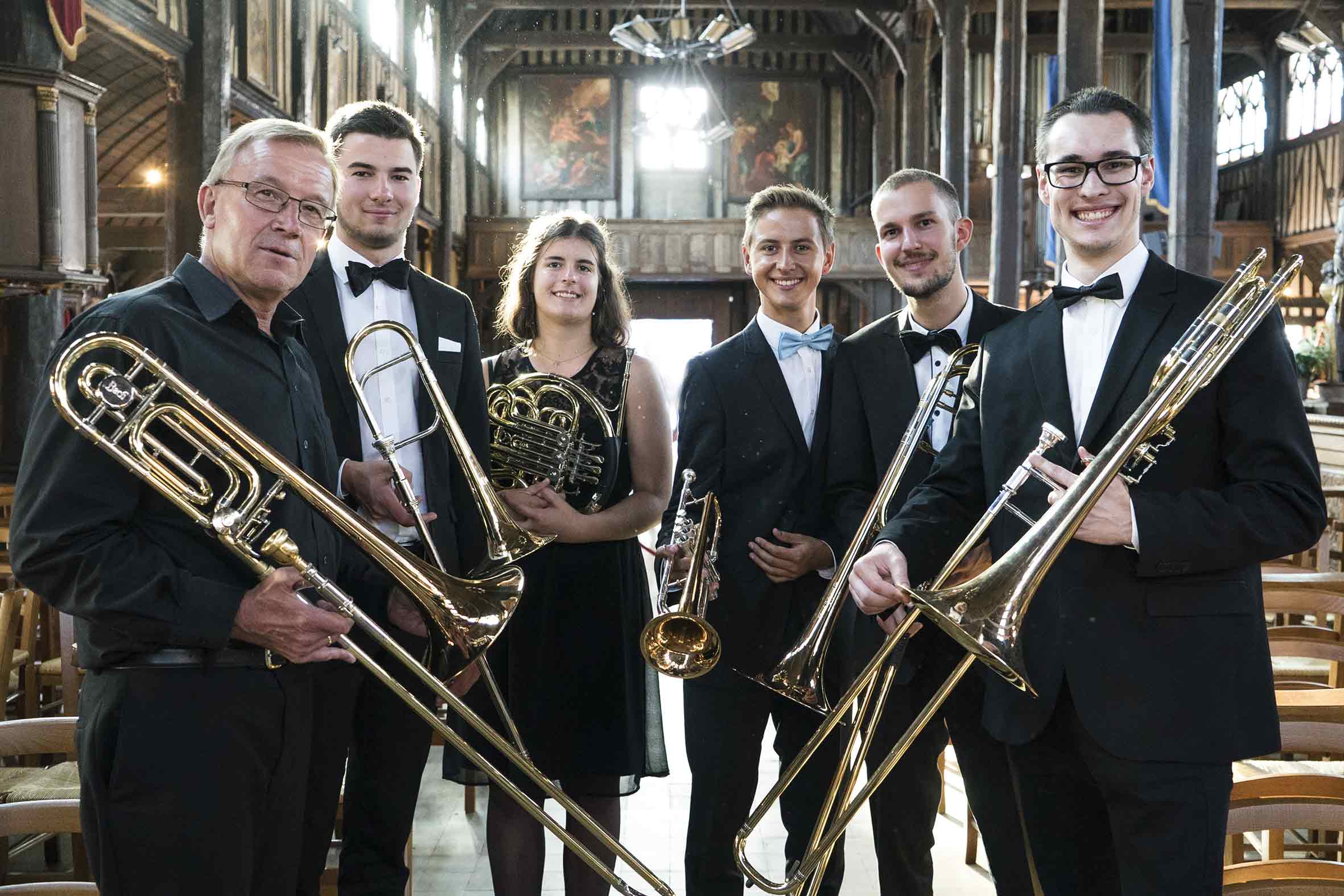 Konzertfotografie mit Posaunen, Trompete und Waldhorn in der Phase des Bezirksjugendsinfonieorchester Unterfranken